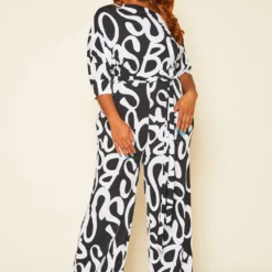 Plus Size Asymmetric Shoulder Abstract Print Jumpsuit
